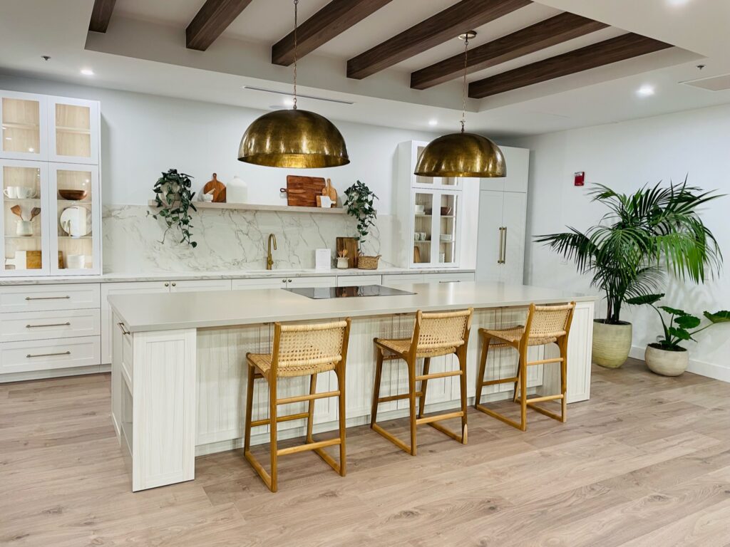 Tile Flooring Open space luxury kitchen with a three seating island by FloorCo Premium in Temple, Waco, and Killeen, Texas.
